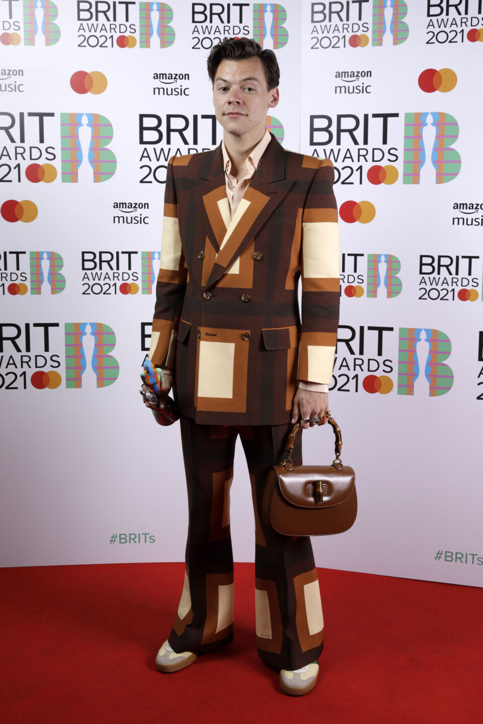 harry styles i gucci brit awards.jpg