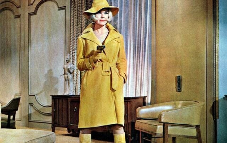 Kender du den dystre historie bag din trenchcoat?