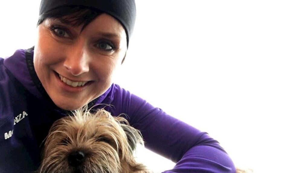 Anne Honoré Østergaard med sin hund