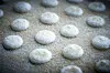 Macarons med fyld af champagne og mørk chokolade