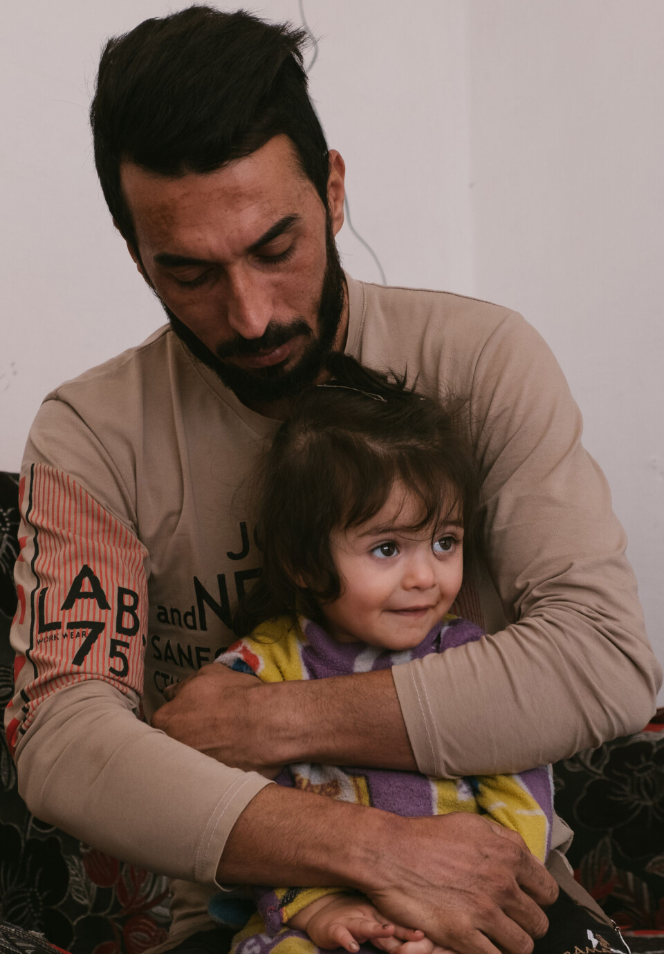 UNICEF - Sibal 1,5 år sidder hos far.jpg