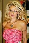 CENTURY CITY, CA - AUGUST 6:  Actress Pamela Anderson poses at a book signing for her new book 'Star' at 'Brentano's Books' on August 6, 2004 in Century City, California.  (Photo by Megan Gaynes/Getty Images)