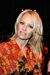 PARIS, FRANCE - SEPTEMBER 28:  Pamela Anderson attends the Vivienne Westwood show as part of the Paris Fashion Week Womenswear  Spring/Summer 2014 at Le Centorial on September 28, 2013 in Paris, France.  (Photo by Pascal Le Segretain/Getty Images)