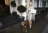 LONDON, ENGLAND - DECEMBER 12:  Pamela Anderson accompanied by rescued dog Zorro deliver a 178,000-name petition to the High Commission of Mauritius, urging the country to implement a spay-and-neuter programme to tackle its stray-dog problem at High Commission Of Mauritius on December 12, 2016 in London, England.  (Photo by John Phillips/Getty Images)