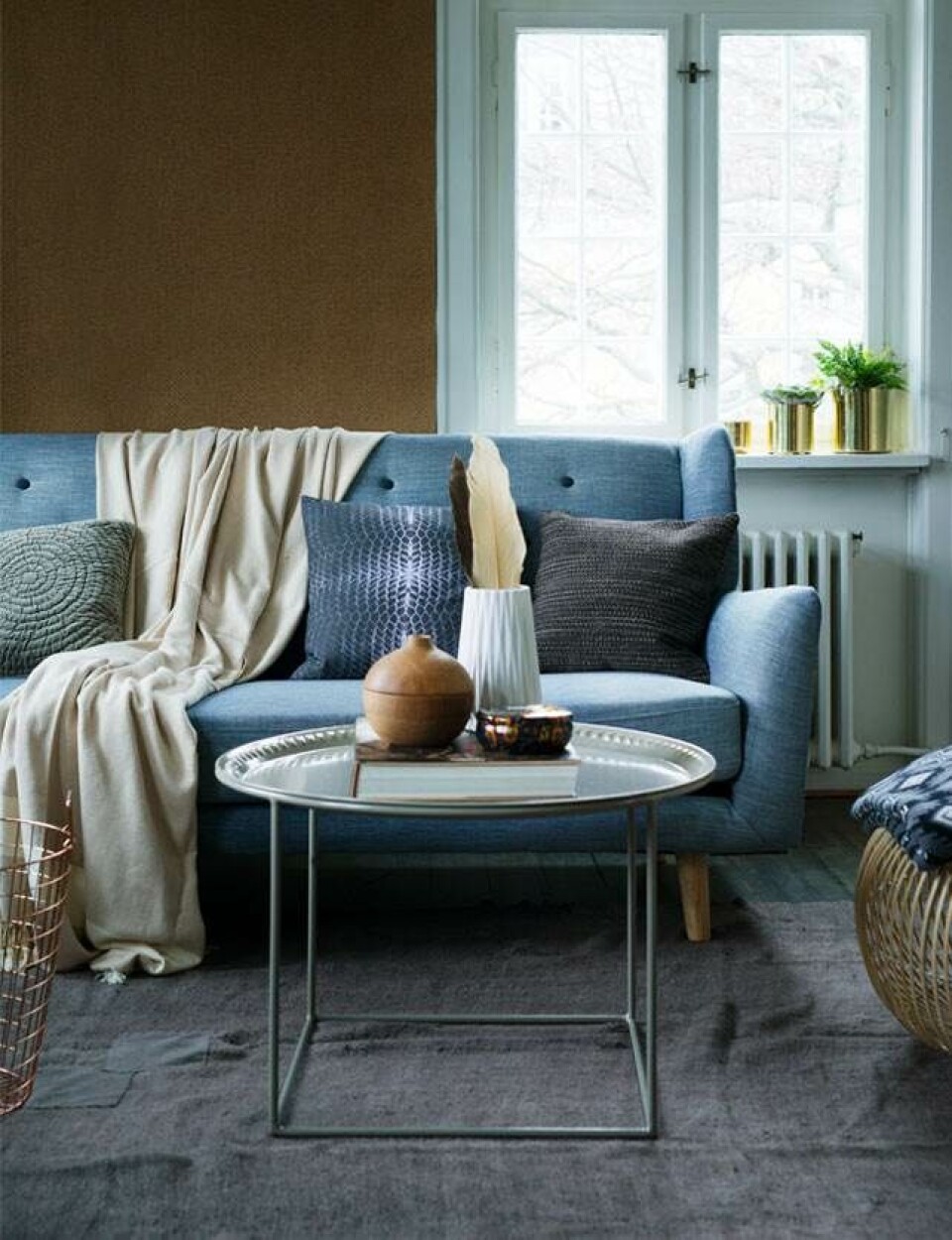 Ny stil i stuen: 3 look med den samme sofa