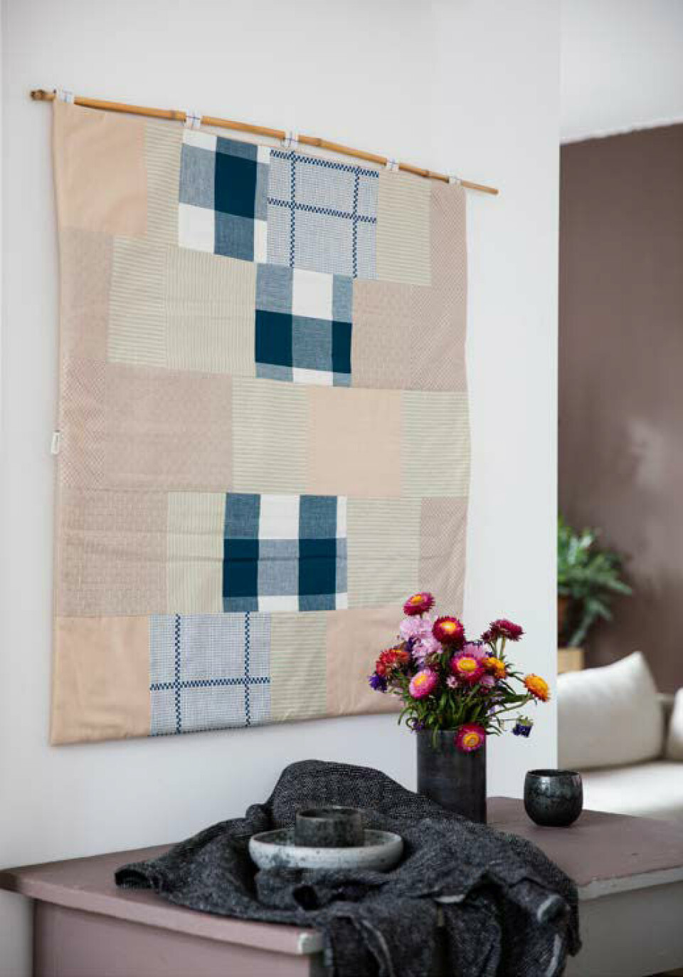 Patchwork-vægtæppe af viskestykker