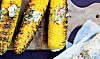 Majs på grill: Grillede majskolber med kryddersmør