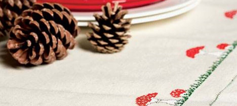 Brodér en juledug med fluesvampe