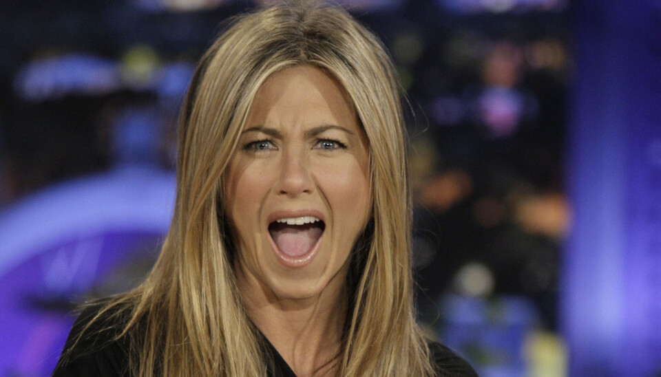 Jennifer Aniston ser overrasket ud med åben mund