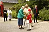 Dronning Margrethe og prins Henrik modtager ringrideroptoget i 2012.