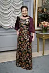 Europaminister Marie
Bjerre, 39, funklede med
pailletter i blomstermotiver fra Marianne Carøe.