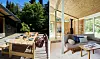 Lyst sommerhus med træterrasse, lang spisebænk og stue med sofa og store vinduer mod grøn have.