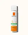 La Roche-Posay Anthelios SPF 50 solsprayflaske på lys baggrund