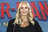Sille Nimholm foran blå Spider-Man: Brand New Day bagvæg ved premiere
