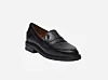 En enkelt sort læderloafer i klassisk design på lys baggrund