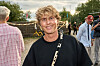 Smilende gæst ved Reality Awards sommerfest 2026 i udendørs selskab